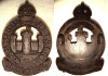 M169a - Garrison Battalion Bakelite Plastic Cap Badge